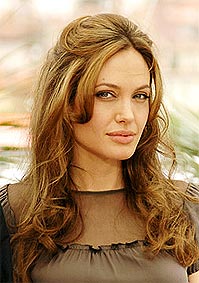 Анджелина Джоли като прелъстителката на Томас Краун